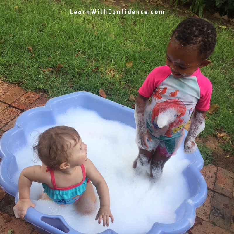 snow in summer, bubble fun, baby pool, sisters, swimming